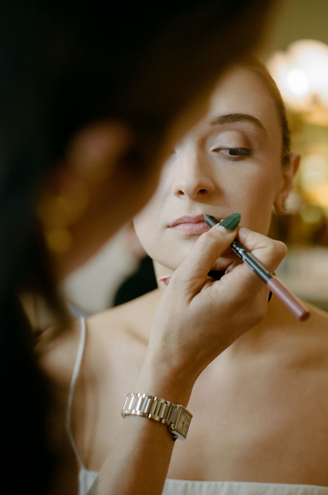 Lauren embracing a bride on her wedding morning