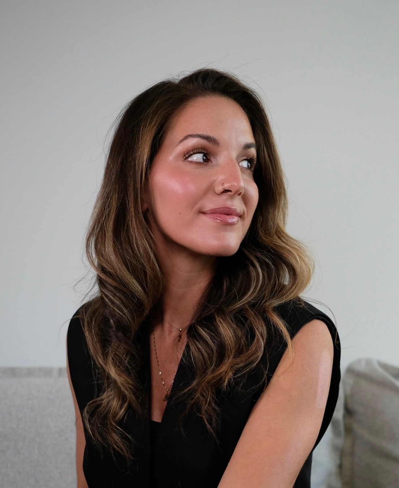 Lauren applying makeup to a client